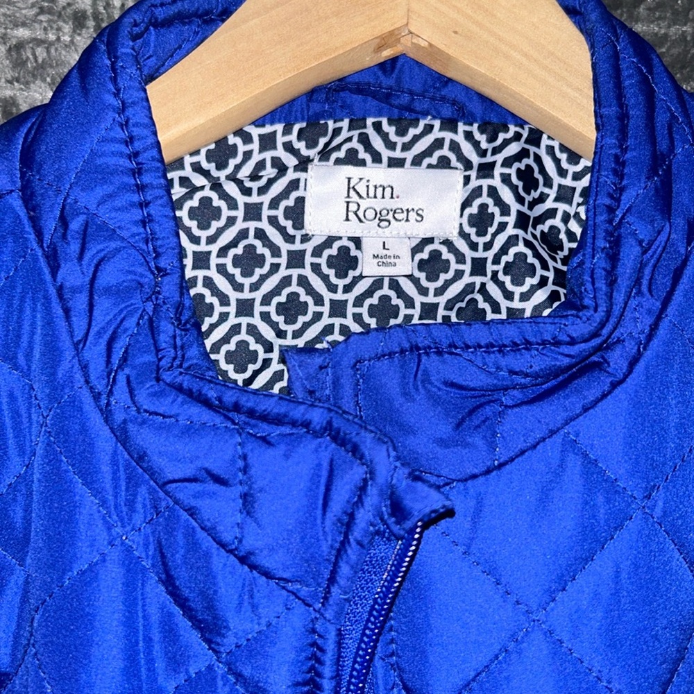 Kim Rogers blue vest